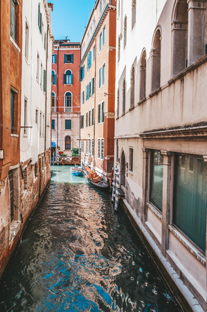 Venice, city of Italy. View of the canal, the Venetian landscape with boats and gondolas.の写真素材