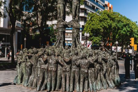 Tarragona, Spain-August 9, 2013: monument of the Castellers on Rambla Nova, Catalonia. Attractions...