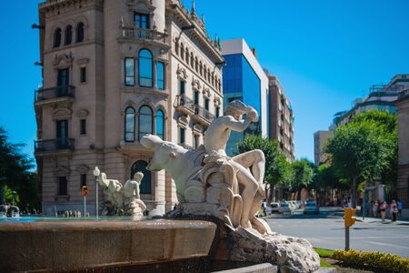 Tarragona, Spain-August 9, 2013: view of a sculpture near the fountain symbol of the four parts of the world.のeditorial素材