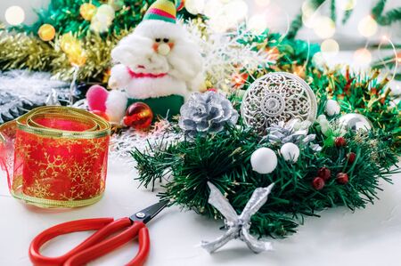 Set of ornaments for the Christmas tree. Homemade wreaths and garlands to decorate the house for the holiday.の写真素材