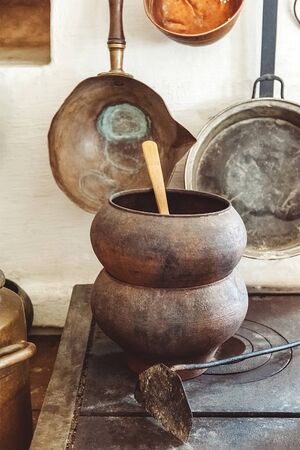 Vintage utensils for cooking large amounts of homemade marshmallows. Processing a large harvest of...