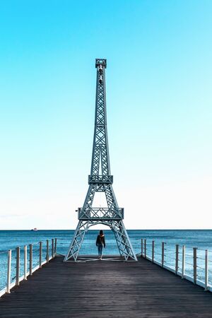 A small replica of the  tower on the beach.