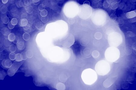 blue and white abstract background with blurry unfocused bokeh light for the template. Natural blue highlights for a design solution.の写真素材