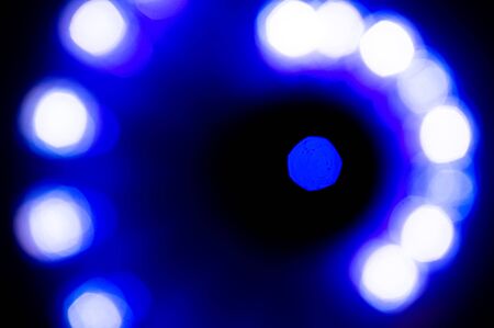blue and white abstract background with blurred unfocused spherical bokeh light for template....