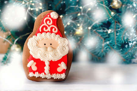 Gingerbread man Christmas cookies with Santa's hat beard and mustache. Santa Claus with Christmas...