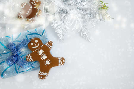 Decorative figure of a gingerbread man on a Christmas background. Decorative Christmas picture with...