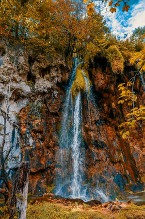 Plitvice Waterfalls in Croatia is one of the most famous famous places in Europe, very beautiful. The water jets against the background of autumn forests at sunrise are very picturesqueの写真素材