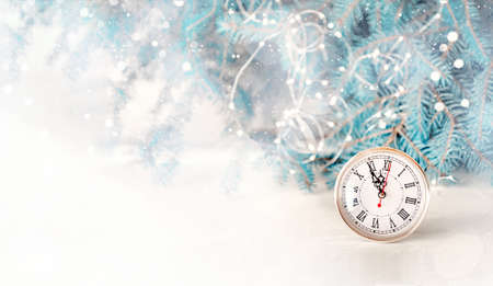 Christmas card with an alarm clock and gifts in boxes under the Christmas tree. A ready-made...