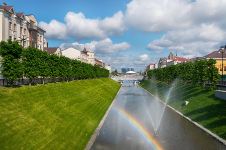 Kazan, Russia, June 1, 2023: view of the Bulak water canal with rainbow, bridges and fountains in the city centre on a sunny summer day. View towards the Kazanka Riverのeditorial素材