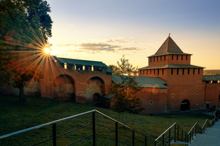 The wall and tower of the Nizhny Novgorod Kremlin in the rays of the setting sun. Sights and tourist routes of Nizhny Novgorod.のeditorial素材