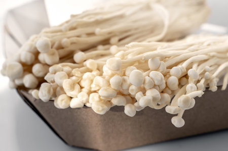 Enoki close-up. Close-up of fresh white shimeji mushrooms Japanese food is naturally nutritious and...