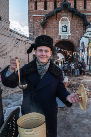 Kolomna, Moscow region, Russia March 10, 2019: sale of sbitnya on Maslenitsa People celebrate Maslenitsa. Maslenitsa is a Russian holiday. People eat pancakes, play folk games, have fun in winterのeditorial素材