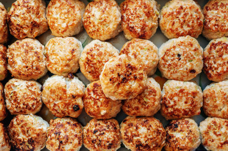 semi-finished meatballs. lightly fried meatballs are ready to cook. Meatballs background. Close upの写真素材