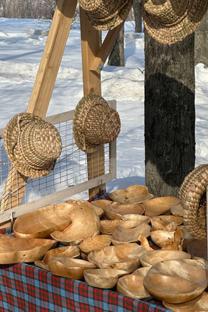 Suzdal, Russia, March 16, 2024 Sale of souvenirs made from different types of wood, folk art, handmade. Showcases with Russian folk craftsのeditorial素材