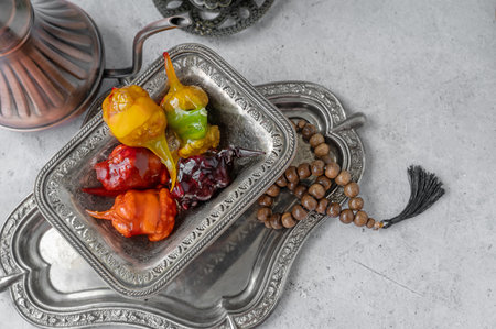 Multicolored churchellas on a richly decorated silver dish in the interior of the holiday table...