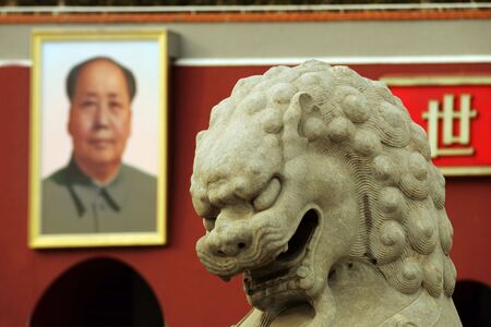 Ancient Lion and Mao painting in front of Forbidden Palace, Beijing の写真素材