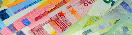 Euro banknotes background. European currency. Cash money for payment. Financial calculations concept.の写真素材