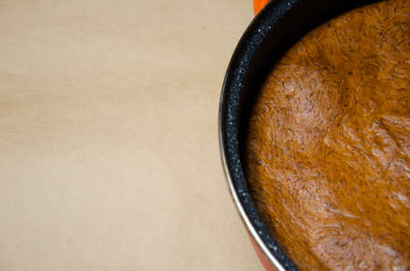 Concept homemade fall baking with pumpkin and food ingredients. Cooking pumpkin pie. Texture of baked pumpkin pie in baking dish. Step by step instructions. Step 6.の写真素材