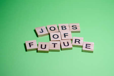 Concept of jobs of the future. Selective focus on Inscription jobs of future on blurred background. Banner on green background with copy space.の写真素材