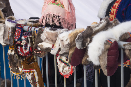 Nenets mittens from fur are selling in the winter streetの写真素材