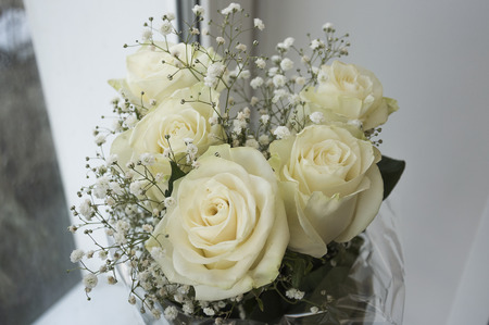 White tender roses in the bouquetの写真素材