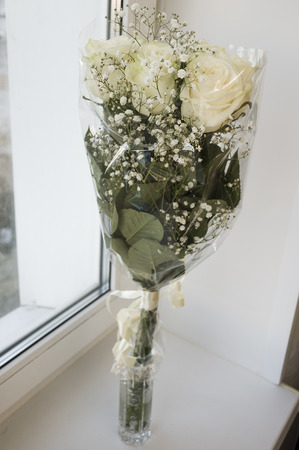 White tender roses in the bouquetの写真素材