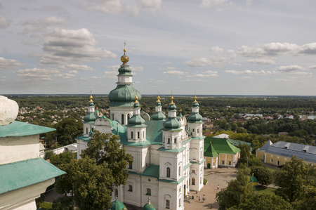 Chernigov, Ukraine. August 15, 2017. Christian orthodox white church with green domes and gold crosses. View from high.のeditorial素材