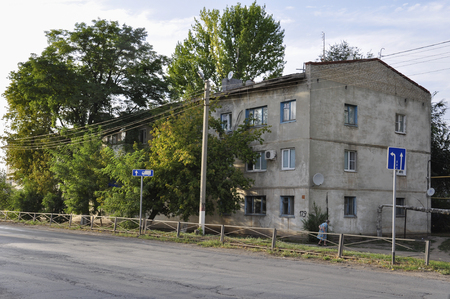 Pugachev, Saratov region, Center of Russia. August 1, 2017. Old house and green trees on the town streetのeditorial素材