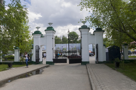 Tomsk, Russia, The National Research Tomsk State University in summer day. July 10, 2017. Lot of tulips aroundのeditorial素材