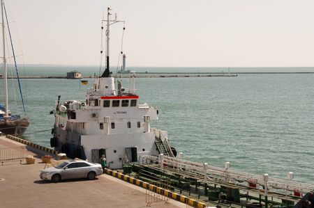 Odessa, South of Ukraine, The customs area, July 10, 2018. Odessa commercial sea port. Beautiful yachshts. Sailboats at the dockのeditorial素材