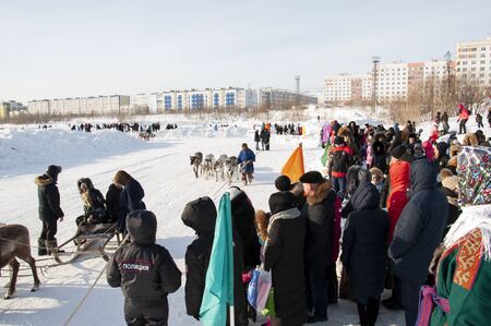 New Urengoy, YaNAO, North of Russia. March 1, 2019. The holiday of north nationality. Nenets man and north deer in winter day. Editorialのeditorial素材