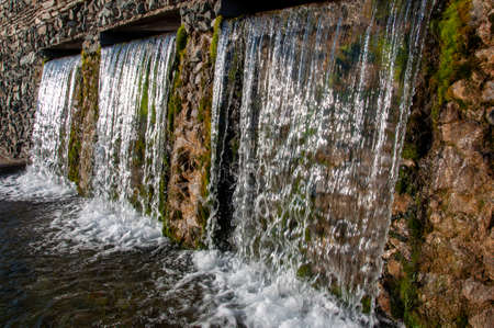 Mineral spring. Stream. SPA. Curative water. Resort. Waterfalls. Summerの写真素材