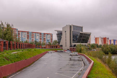 Surgut, Russia, 12 Griboyedov Street, May 11, 2022. Modern buildings and view of the embankment of the Ob riverのeditorial素材