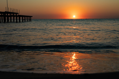Beautiful sunset over the sea. The sun is reflected in the water. Turkeyの写真素材