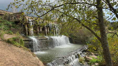 Waterfall.Dam on the river, spillway.の写真素材