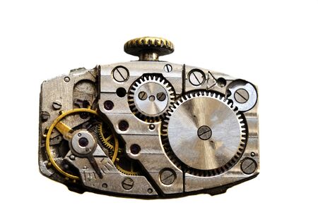Close view of old clock mechanism with gears and cogs.Isolated on white backgroundの写真素材