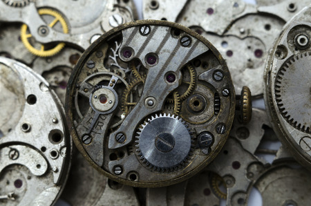 Vintage clockwork isolated on the clockwork backgroundの写真素材