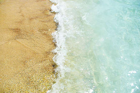 waves of the sea in the beach with a sand