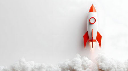 Rocket taking off on a white background. 3D rendering. Startup concept. Copyspace. toy spaceshipの素材