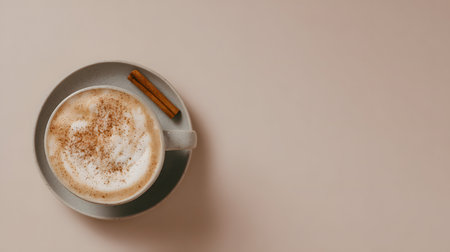 Autumn composition. Cup of coffee, pumpkins, and spices on a white background. Flat lay, top view. Pumpkin latte or cappuccino with cinnamon.の素材