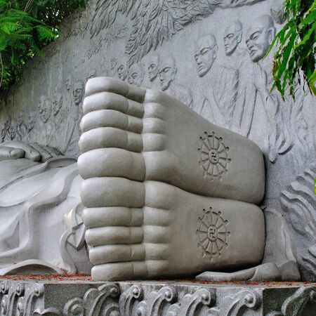 Heels of the statue of the lying Buddha at the Long Son complex, Nha Trang, Vietnamの写真素材