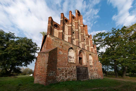 A brick-built Gothic church erected in 1405 in Allenburg, Druzhba settlement, Kaliningrad region, Russiaの写真素材