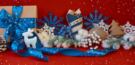 Panoramic composition on a red background. Merry christmas and happy new year greeting cardの写真素材