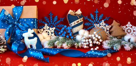Panoramic composition on a red background. Merry christmas and happy new year greeting cardの写真素材