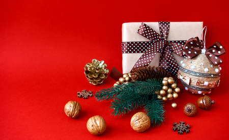 Holiday composition on a red background. Merry christmas and happy new year greeting card