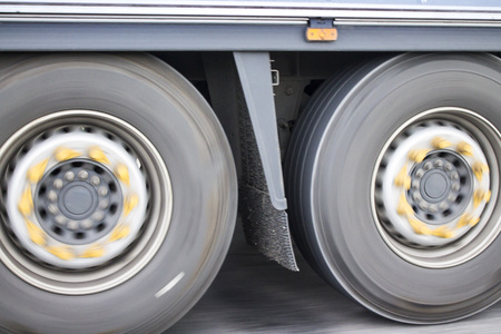 Photo of truck wheels in motion blur.の写真素材
