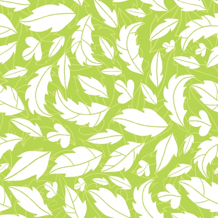 White on green leaves silhouettes seamless pattern backgroundの写真素材