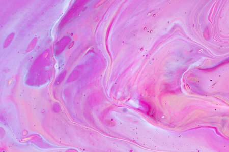 Fluid art painting. Abstract decorative marble texture. Background with liquid acrylic. Mixed paints for poster or wallpaper. Modern art. White, purple and golden colors.の写真素材