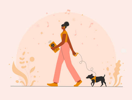 Afro woman with earphones listening to a music.のイラスト素材