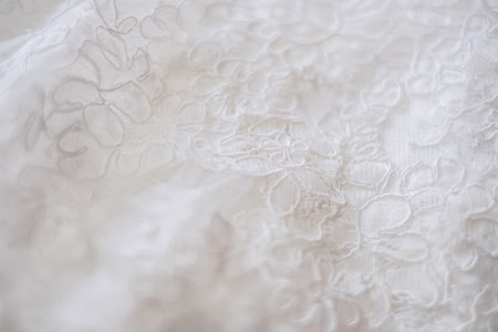 Close up of a lace on a wedding dress. High quality photo.の写真素材